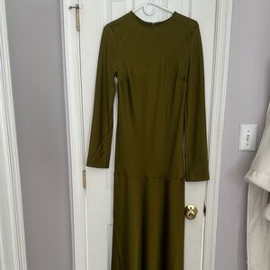 Elegant Olive Green Long Sleeve Dress
The dress was altered in the back